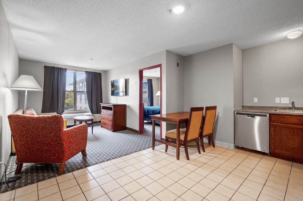 Spacious suite living and dining area at TownSquare Place